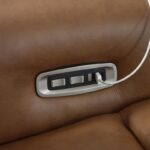 Magic Man brown leather reclining sofa 3-piece power sectional in a modern Tampa living room.