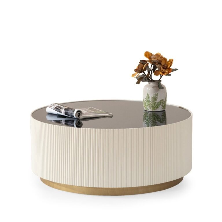 Round modern coffee table with a reflective top and elegant design.
