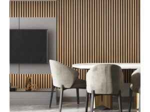 Natural oak fluted wall panel accent wall in a modern dining room setting with a built-in gray media console and TV. Features light wood texture and black grooves.