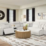 Modmax II light gray reclining sectional sofa with power recliner and chaise open in a modern living room.