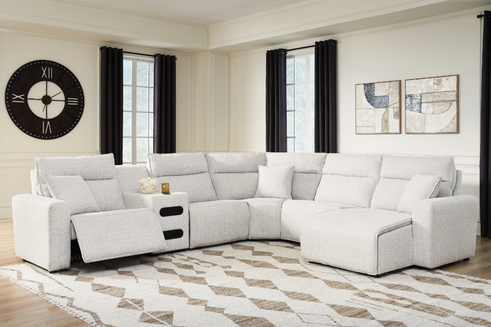 Modmax II light gray reclining sectional sofa with power headrests and console in a modern living room layout.