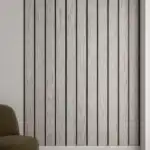 Gray fluted PVC wall panel with wood grain texture and matte finish for decorative walls