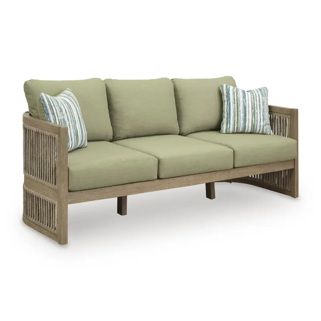Angled view of Gumbet green outdoor sofa / couch showing curved silhouette, rope-wrapped arms, and wood-look eucalyptus frame