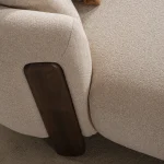 Harper beige sectional sofa close-up with distinctive walnut wood accent