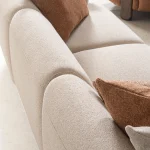 Harper cream sectional sofa close-up showing premium fabric upholstery and deep seating
