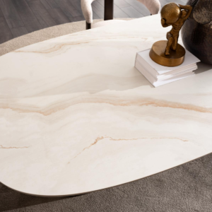 Close-up view of the ICON Dining Table's marble-look veneer top, showcasing its elegant design and texture.