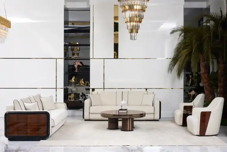 Luxury modern living room furniture set with off-white sofas, glossy dark wood, and crystal chandelier in Tampa.