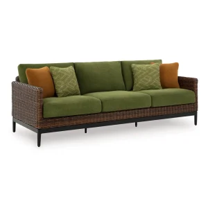 Kemer green outdoor sofa with brown wicker shown from an angle
