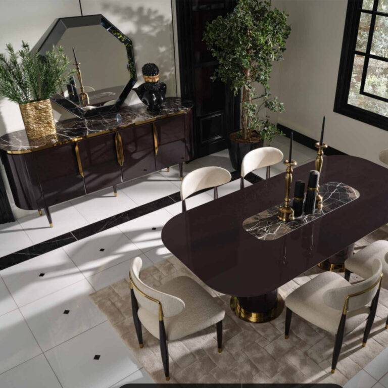 Luxurious dining room set with elegant table, chairs, and sideboard featuring a marble top and gold accents.