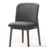 Modern upholstered dining side chair with wenge wood frame.side
