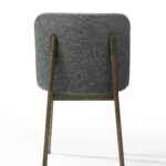 Modern upholstered dining side chair with wenge wood frame.back