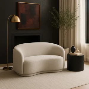 Modern beige loveseat with a curved design and soft chenille texture in a minimalist Tampa living room.
