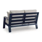 Angled back view of Sile aluminum navy blue outdoor loveseat showing horizontal slat design and navy blue powder-coated frame