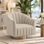 Pelin beige swivel chair with pearl-look velvet and gold metal base in a Modern Tampa House