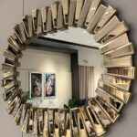 piano oval gold mirror