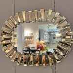 piano oval gold mirror