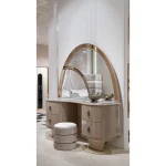 Royal beige bedroom vanity with arched mirror and upholstered stool