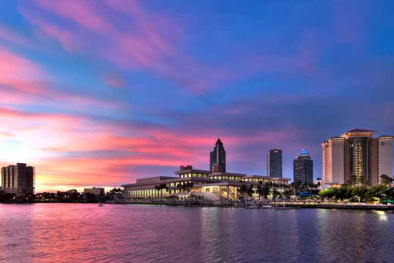 A vibrant sunset over the Tampa skyline, connecting to local furniture stores.