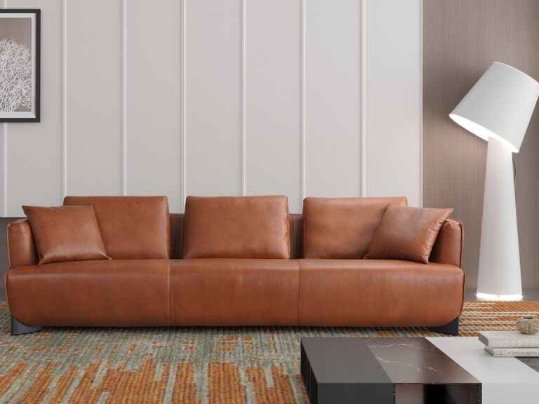Modern Italian leather sofa in cognac top grain leather – Tampa furniture showroom.