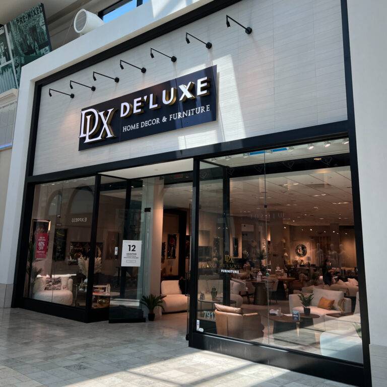 De'Luxe Home Decor & De'Luxe Home Decor & Furniture store exterior in Tampa, showcasing a modern and welcoming entrance with custom furniture on display.