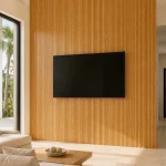Oak WPC fluted wall panel installed behind a TV in a modern living room