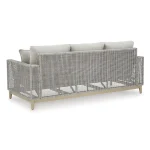 Back view of Yalı gray outdoor sofa showing full gray wicker construction, wood-look legs, and open-weave design